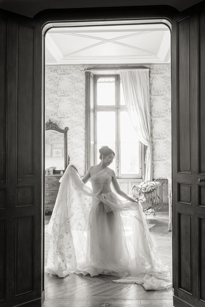 Couple having fun during their Château Challain bridal shoot