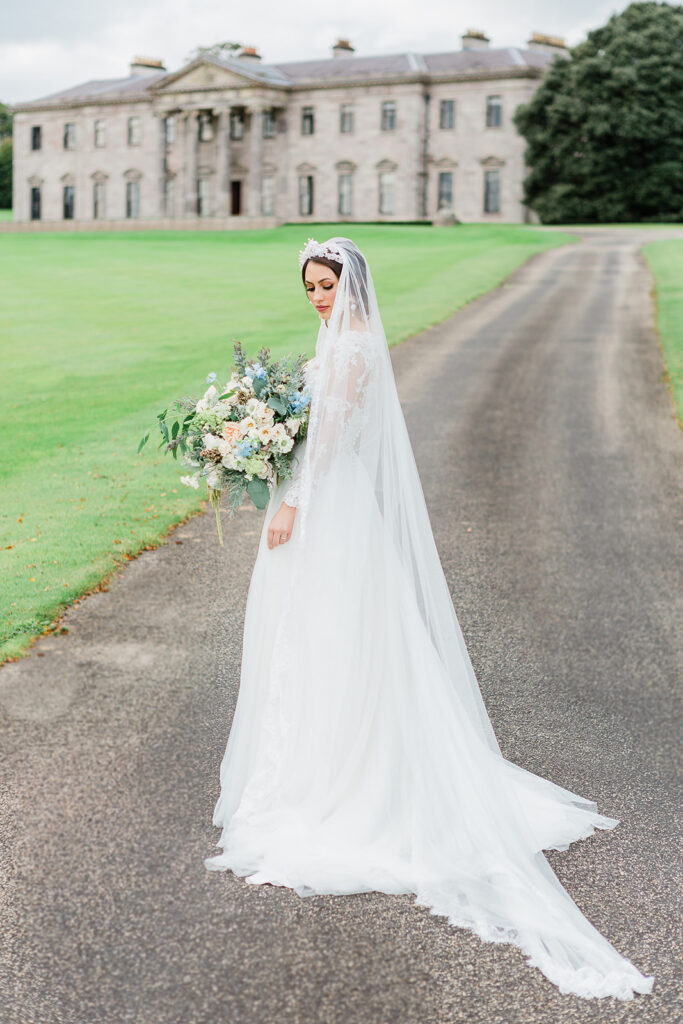 The bride walking up the road to Ballyfin