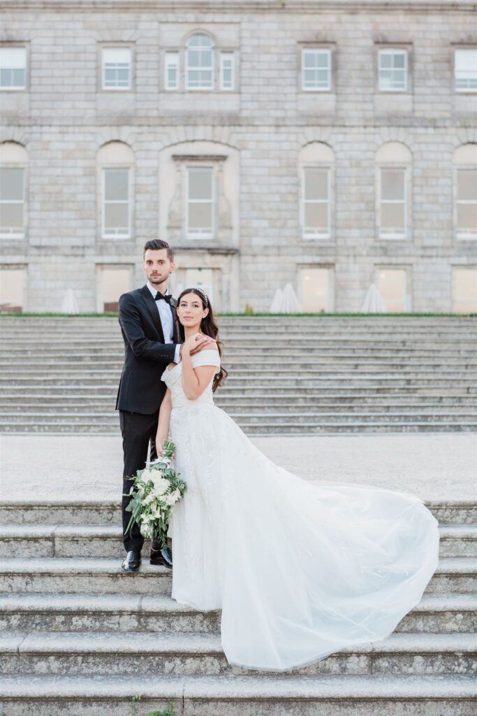 The bride and groom portrait outside the stairs at Luttrelstown Castle
